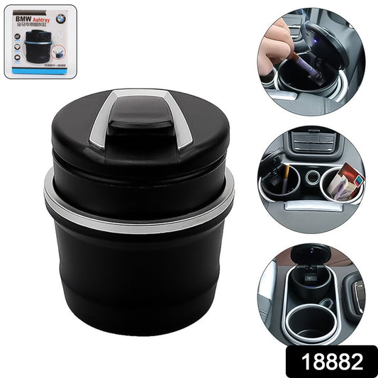 Car ashtray showing lid open for ash disposal