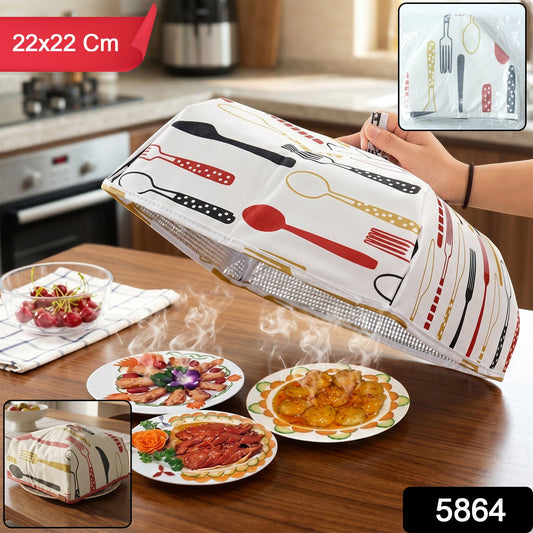 CookAura foldable food cover protecting a plate in the kitchen