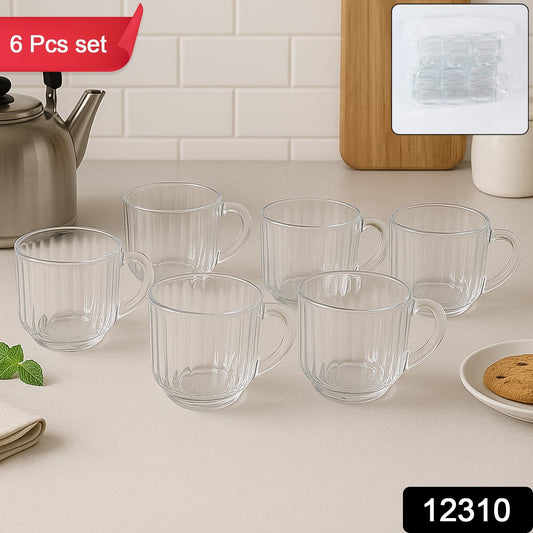 Close-up of ergonomic handle on transparent plastic tea cup