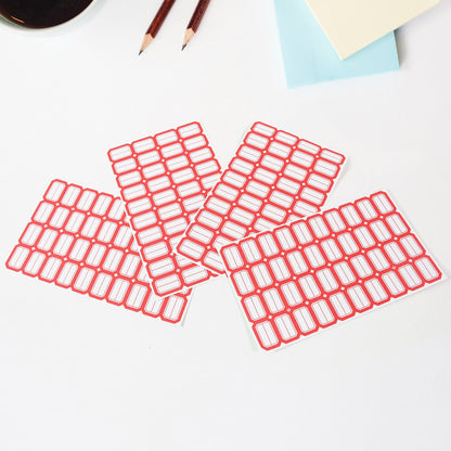 Stack of red border label stickers for versatile home and office organization.