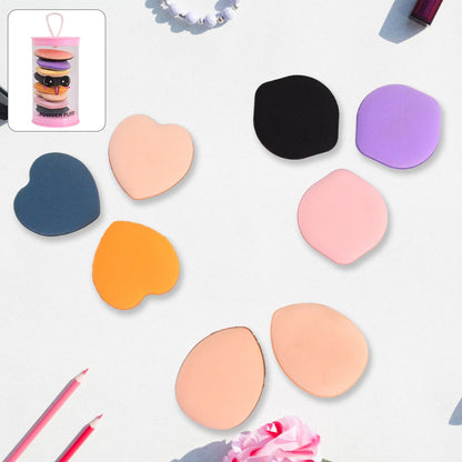 Close-up of mini finger makeup powder puff for foundation and concealer