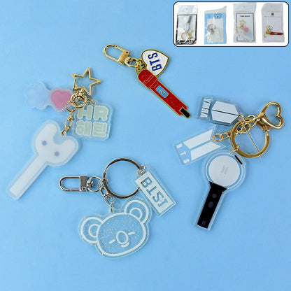 Acrylic and metal keychain featuring a microphone design
