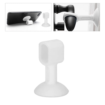 Silicone door stopper attached to metal door handle preventing wall damage