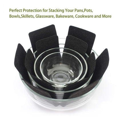 Pots and pans stacked with felt protectors between to avoid scratches and damage
