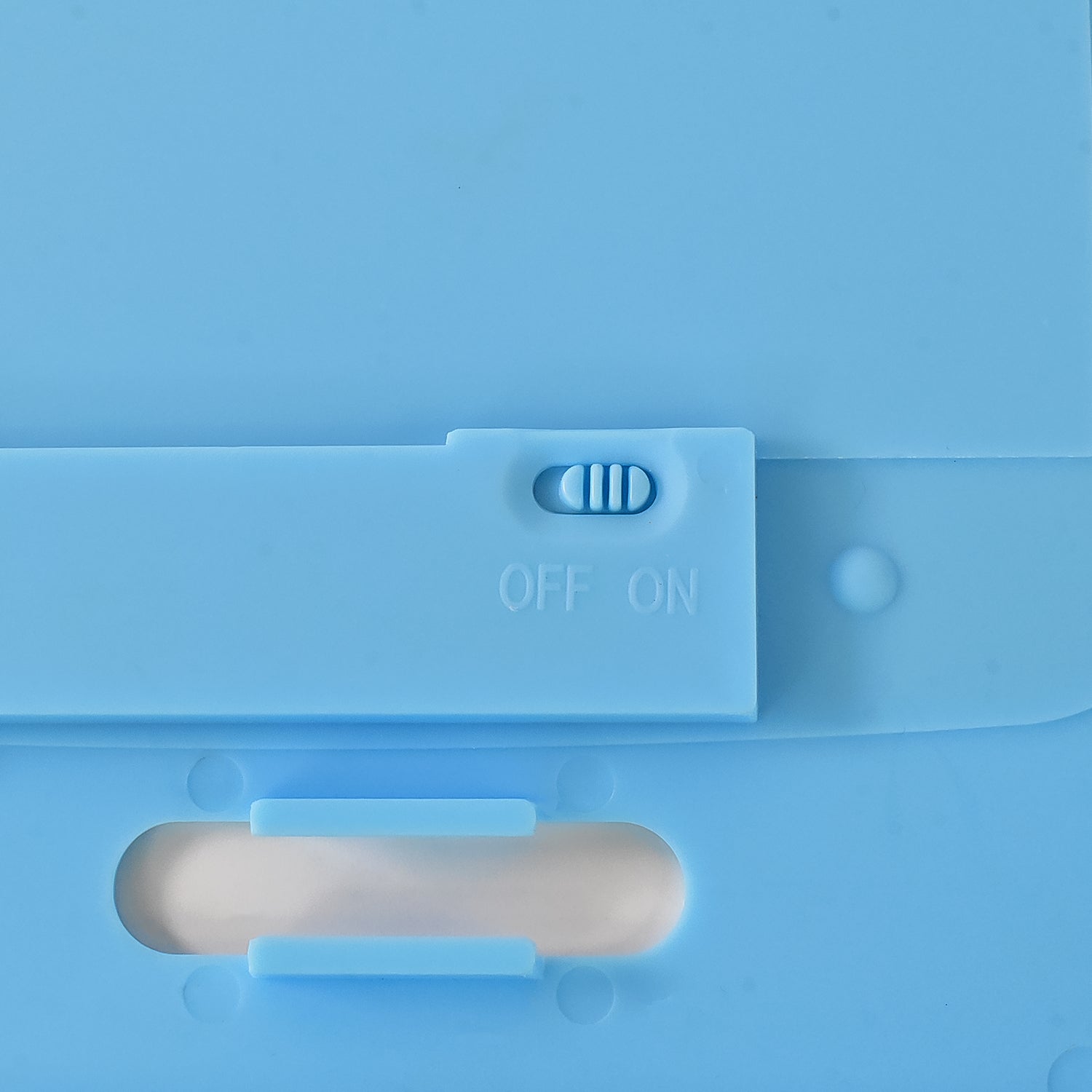 Child's hands holding and drawing on portable LCD writing tablet