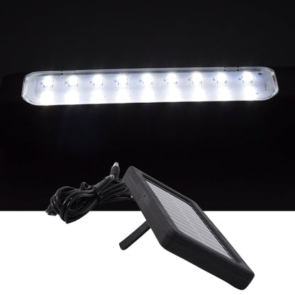Eco shine mode lit on outdoor hanging solar LED light in garden setting