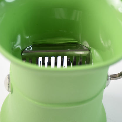 Close-up image of sharp stainless steel blades of manual cutter grinder
