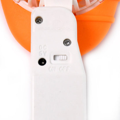 Compact personal mini fan showcasing its small size for convenient use