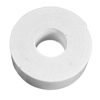 Double sided foam mounting tape used to stick posters and decorations on a wall.