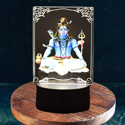 Lord Shiva 3D LED Frame glowing with soft warm white light in a dark room