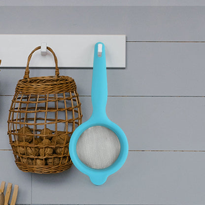 Side view of Kadak mesh strainer with plastic handle