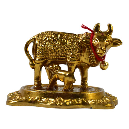 Dhan Laxmi themed golden Kamdhenu Cow metal idol for pooja