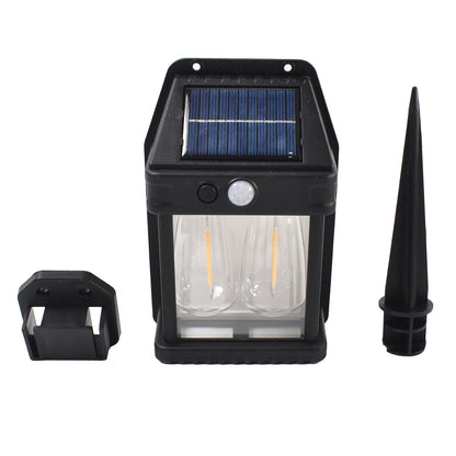 Warm white LED illumination from solar double light on garden fence