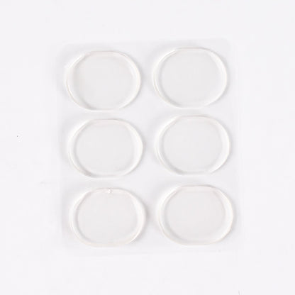Silicone shoe pads in use inside comfortable footwear cushioning the heel