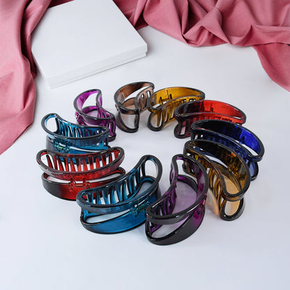 Elegant matte plastic hair clamp grip adding charm and style to any hairstyle.