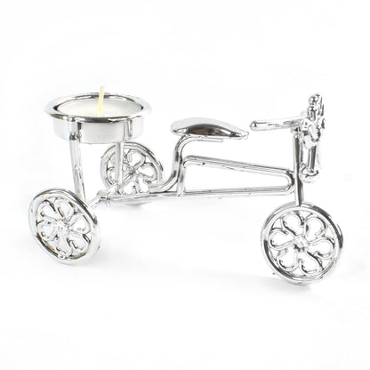 Decorative cycle tealight stand with candle enhancing living space ambiance