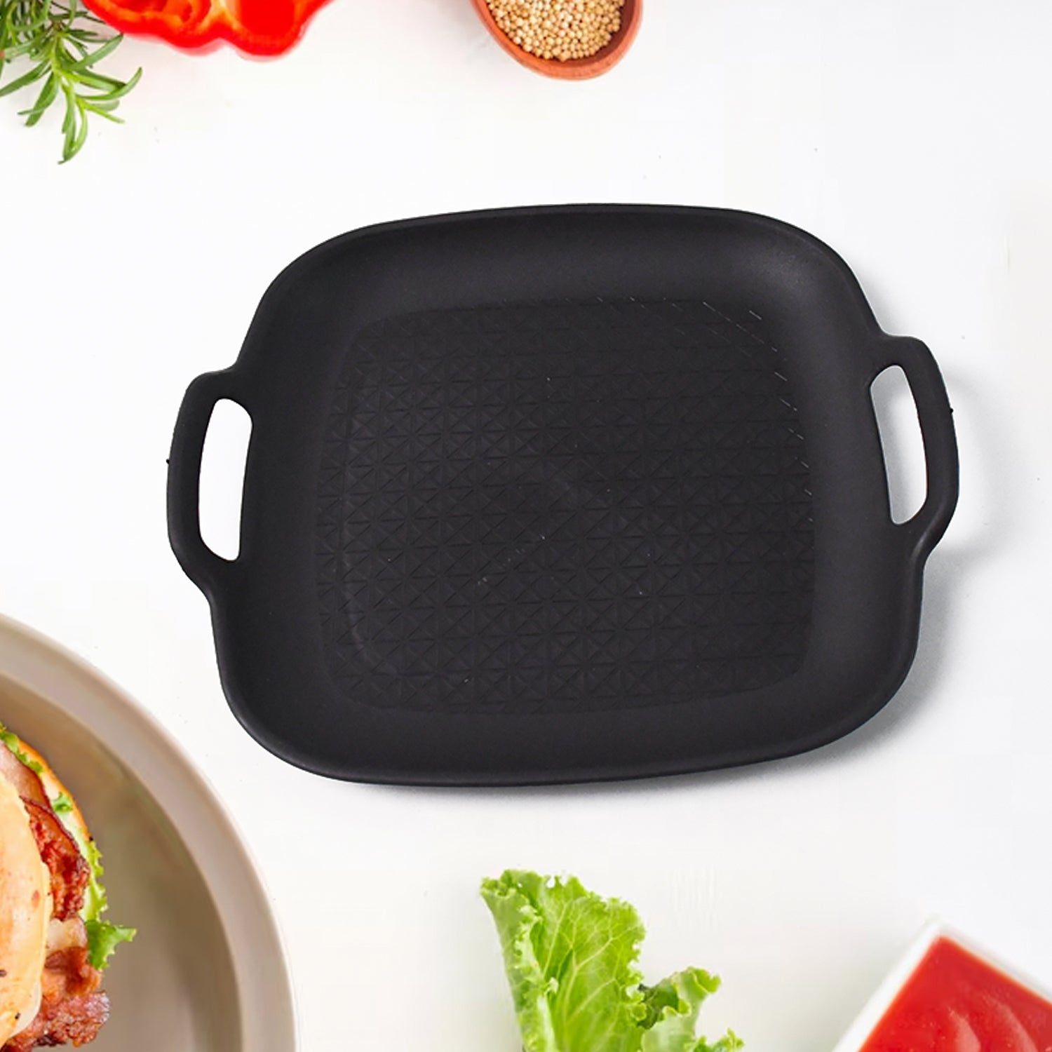 Serving snacks in ceramic cups and glass bowls on plastic plate