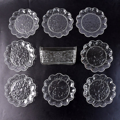 9-piece plastic bowl set with serving tray displaying transparent bowls and plates