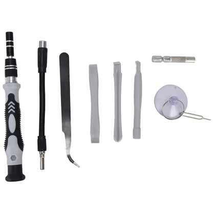 Precision screwdriver tools and bits organized in a compact case