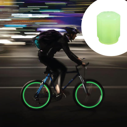 Tire gleam effect from luminous glow tyre valve caps on motorcycle wheels