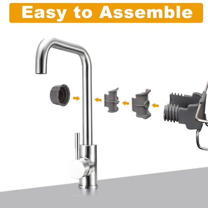 Tidy kitchen sink with soap and sponge stored in stainless steel holder