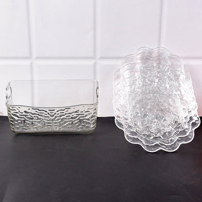 Elegant plastic bowls with textured finish arranged on serving tray