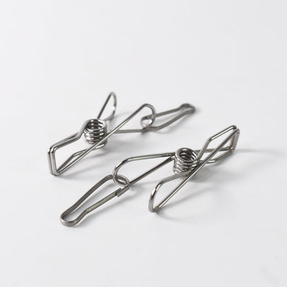 Durable stainless steel clothes pegs holding clothes securely