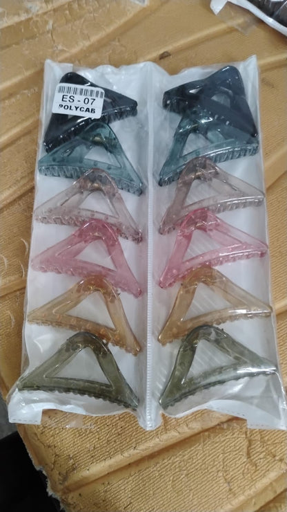 Colorful triangle shaped plastic hair claw clip styled in hair for a chic look