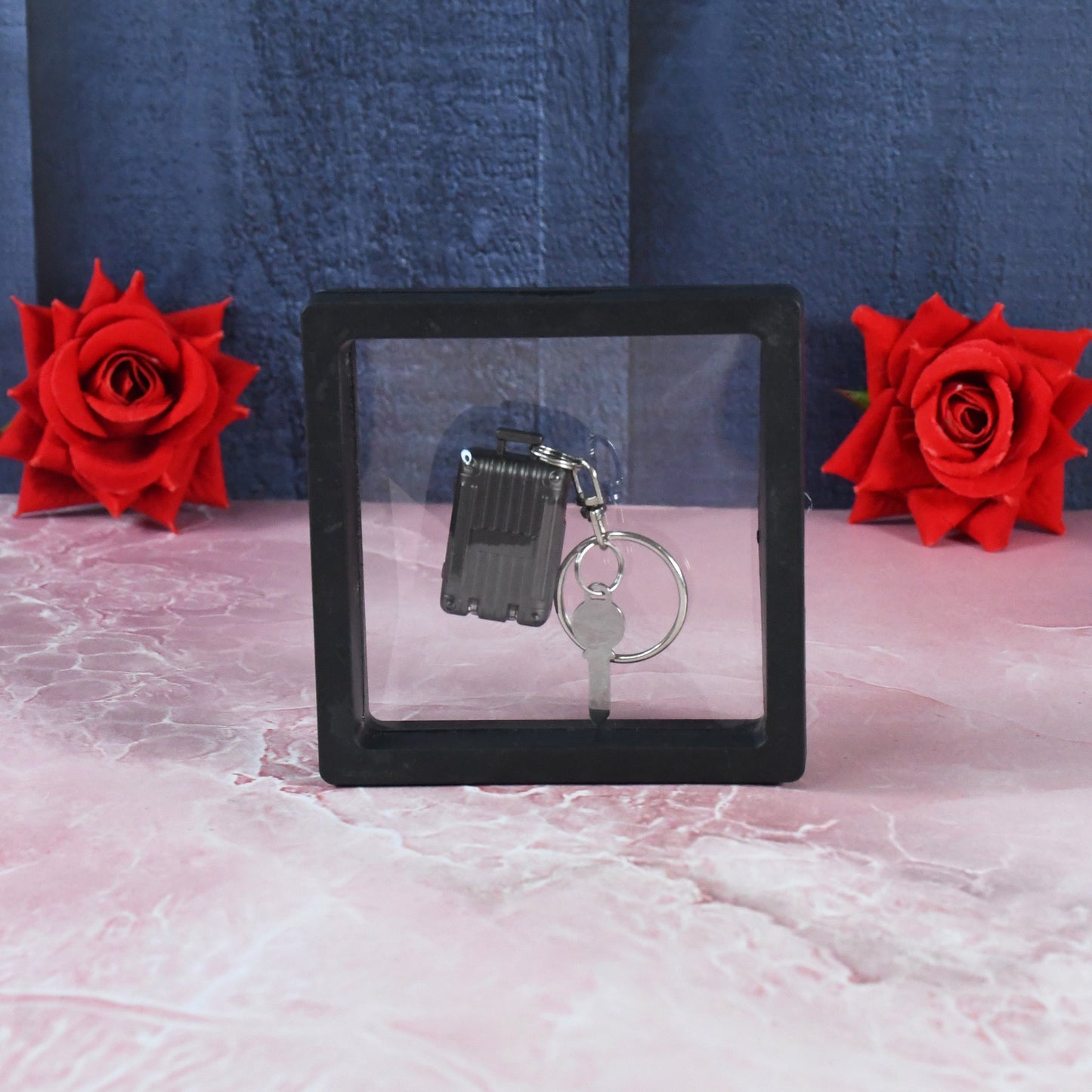 3D floating frame display enhancing the portable nail clipper keychain presentation
