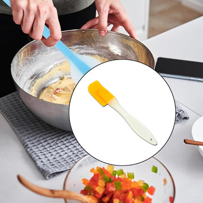 Silicone cooking spatula angled view showing handle and spatula head
