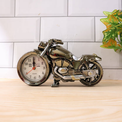 Close-up of motorcycle alarm clock face highlighting analog dial