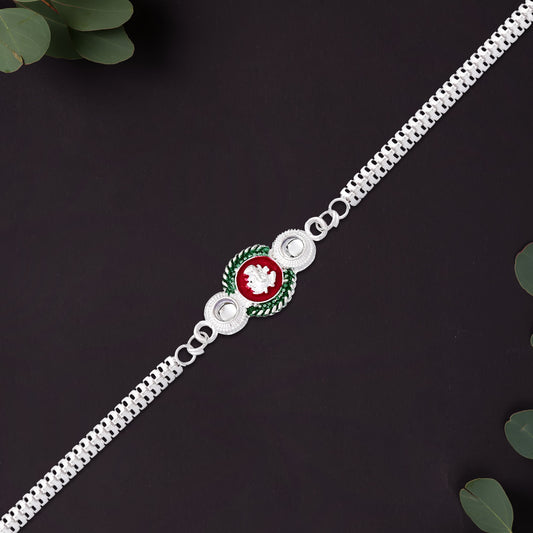 Shiny Silver Rakhi With Ganesha Emblem And Elegant Dual Chain Design