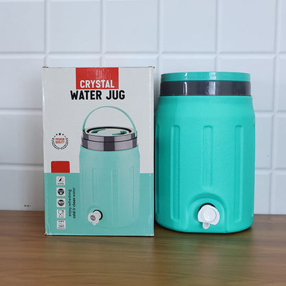 Insulated water jug used outdoors, demonstrating its portability for travel or picnics.