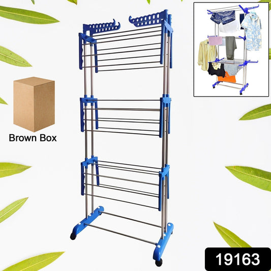 Extendable foldable drying rack displaying multiple garments for indoor drying