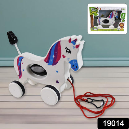 Close-up view of the friendly face and horn of the Unicorn pull along toy