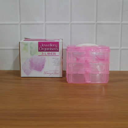 Clear plastic storage box suited for jewelry, crafts and small essentials