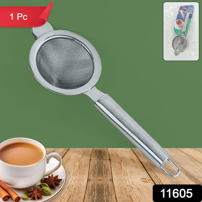 Close-up of stainless steel tea strainer handle with pipe grip