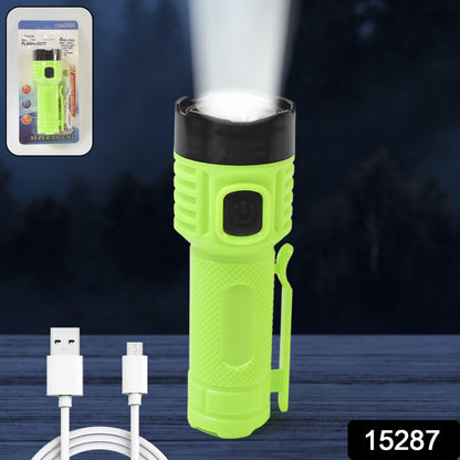 Compact USB rechargeable flashlight torch with belt clamp attached